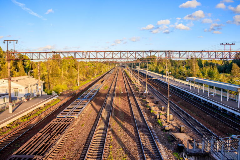Railway in the evening light . Travel by train.
